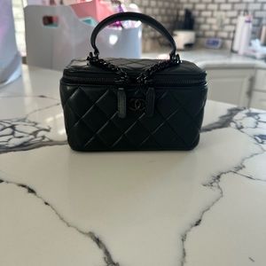 CHANEL Black on Black vanity bag on chain